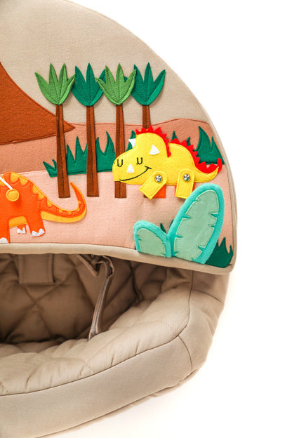 Fauteuil d'activité Rondo beige avec coussin dinosaure