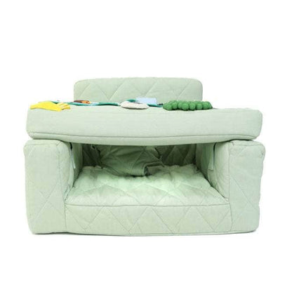 Fauteuil d'activité Ecki vert avec coussin ferme