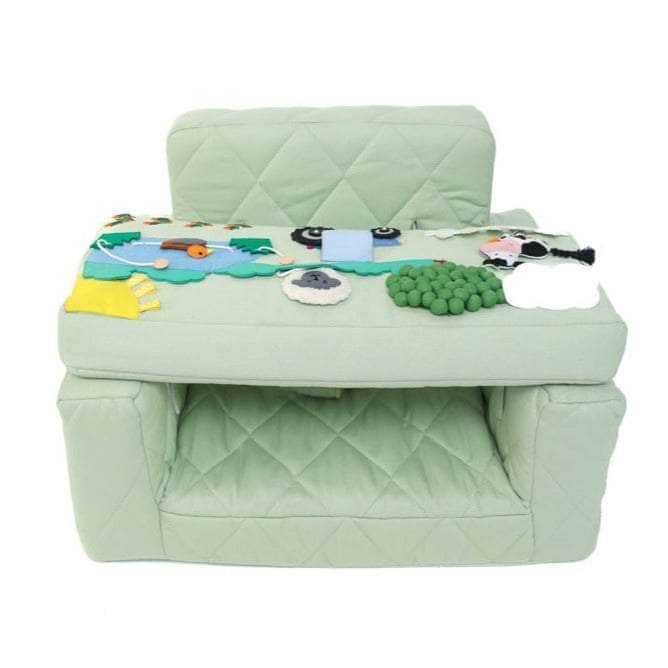 Fauteuil d'activité Ecki vert avec coussin ferme